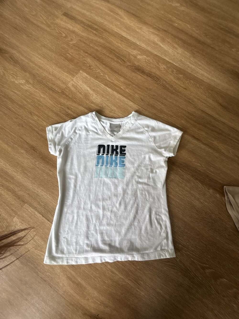 Vintage Nike Women's White V-Neck Stacked Block Logo Graphic T-Shirt
